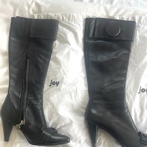 Black high boots, medium size heel, very comfortable to wear all day.